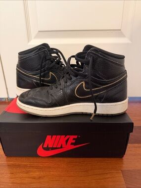Nike Kids Black Air Jordan High-Top Sneakers with Gold Swoosh